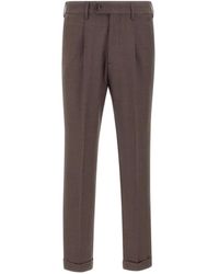 Devore - Hose Mit Falten - Lyst