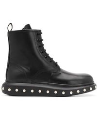 Alexander McQueen Bottes de combat à détails strassés - Noir