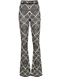 Sandro - Floral-embroidered Flared Trousers - Lyst
