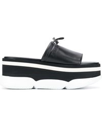Moncler Flat Mules - Black