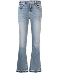 7 For All Mankind - Low-Rise Flared Jeans - Lyst