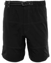 and wander - Contrast-Stitch Belted Shorts - Lyst