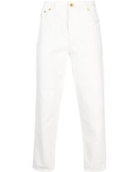 Brunello Cucinelli - Logo-embroidered Tapered Cotton Jeans - Lyst
