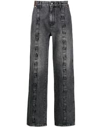 ANDERSSON BELL - Ausgeblichene Jeans mit Kontrastnähten - Lyst
