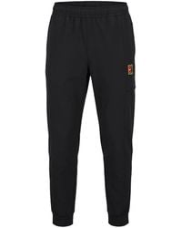 Nike - Logo-Patch Performance Track Pants - Lyst
