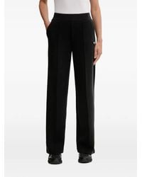 Guess - Logo-Plaque Wide-Leg Track Pants - Lyst