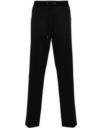 Moncler - Logo-Patch Drawstring Tapered Trousers - Lyst