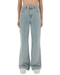 Moschino - Wide-Leg Light Denim Jeans - Lyst