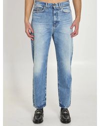 Versace - Stone-Wash Jeans With Studs - Lyst