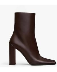 Alaïa - Alaia Square Ankle Boots - Lyst