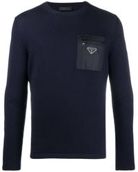 Prada - Logo-Plaque Zip-Pocket Wool Jumper - Lyst