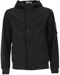 Stone Island - Jacket With Hood And Water- And Wind-Resistant Membrane - Lyst