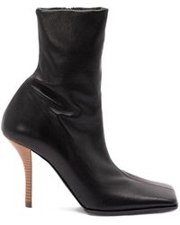 Alaïa - Alaia Noir Leather Ankle Boots 90 - Lyst