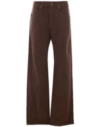 Brunello Cucinelli - Contemporary Loose Cotton Denim Jeans Featuring A Signature Monile Logo Detail - Lyst