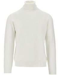 THE PULL - Merino Wool Knitted Turtleneck - Lyst