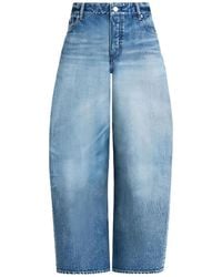 Alaïa - Alaia Rodeo Faded Wide-Leg Jeans - Lyst