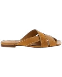 Tod's - Flat Leather Sandals With Crossed Straps - Lyst