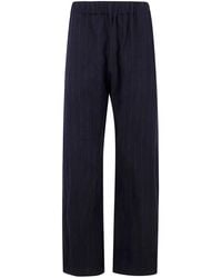 Apuntob - Elastic Waist With Pockets Curved Legs Trousers - Lyst