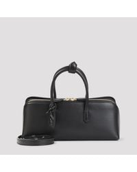 Alaïa - Alaia Box Leather Small Delta Bag - Lyst