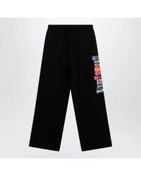 Balenciaga - Jogger Trousers With Logo Print - Lyst