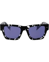 Prada - Sunglasses - Lyst