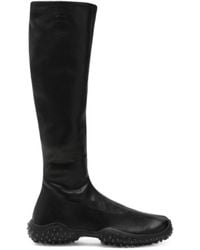 Miu Miu - Logo-Embossed Pebble-Sole Boots - Lyst