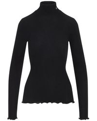 Prada - Ribbed Knit Turtleneck Top - Lyst