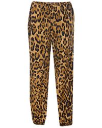 Alaïa - Alaia Animal Print Trousers - Lyst