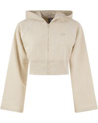 New Balance - Cropped Zip-Up Hoodie - Lyst
