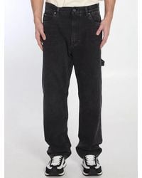 Dolce & Gabbana - Wide Leg Denim Jeans With Logo Plaque - Lyst
