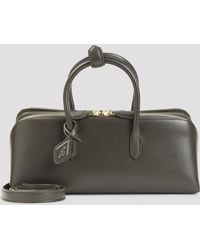 Alaïa - Alaia Box Leather Small Delta Bag - Lyst