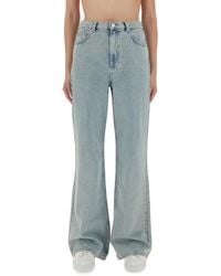 Moschino - Wide-Leg Light Denim Jeans - Lyst