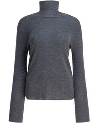 UMARMUNG - Wool Turtleneck Sweater - Lyst