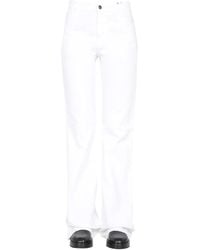 Raf Simons - Flared Jeans - Lyst