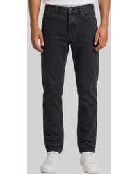 Saint Laurent - Tapered Mid-Rise Jeans - Lyst