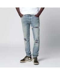 Amiri - Mx1 Distressed Flannelpatched Jeans - Lyst