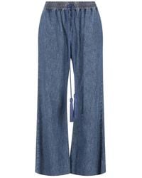 Valentino Garavani - Tassel-Detail Wide-Leg Jeans - Lyst