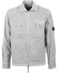 C.P. Company - Shirt With Collar, Chest Pockets One With Button And One With Zipper, Patch With Logo On The Left Sleeve - Lyst