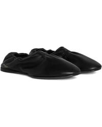 Alaïa - Alaia Noir Leather Slippers - Lyst