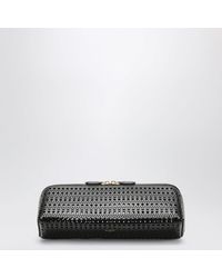 Alaïa - Alaia Delta Calfskin Clutch Bag - Lyst