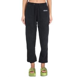 Versace - Jogging Pants With Logo - Lyst