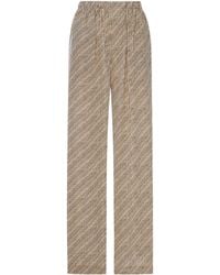 Balenciaga - All-Over Logo-Print Silk Trousers - Lyst