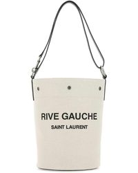 Saint Laurent - Ivory Canvas Rive Gauche Bucket Bag - Lyst