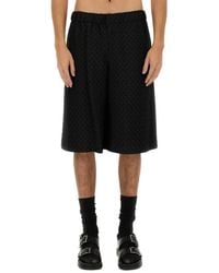 McQueen - Skull Jacquard Pattern Shorts - Lyst
