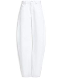 Alaïa - Alaia Rounded Denim Trousers - Lyst