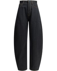 Alaïa - Alaïa Round Wide-Leg Jeans - Lyst