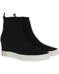 dkny leigh wedge trainer