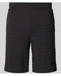 PUMA - Slim Fit Shorts mit Strukturmuster Modell 'ESS ELEVATED' - Lyst