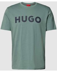 HUGO - T-Shirt mit Motiv-Print und Logo-Print sowie Regular Fit - Lyst