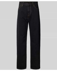 Carhartt - Jeans mit Eingrifftaschen Modell 'AARON' - Lyst